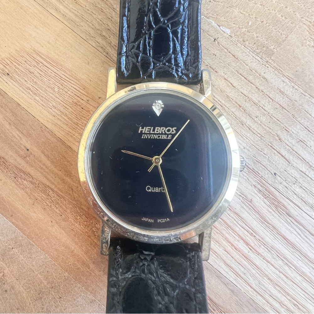 Helbros invincible ladies gold tone and black dress watch NEW BATTERY